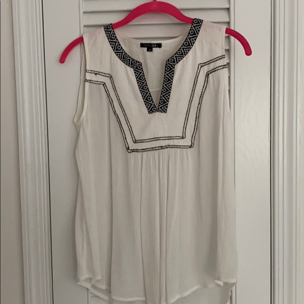 White flowy shirt with black details